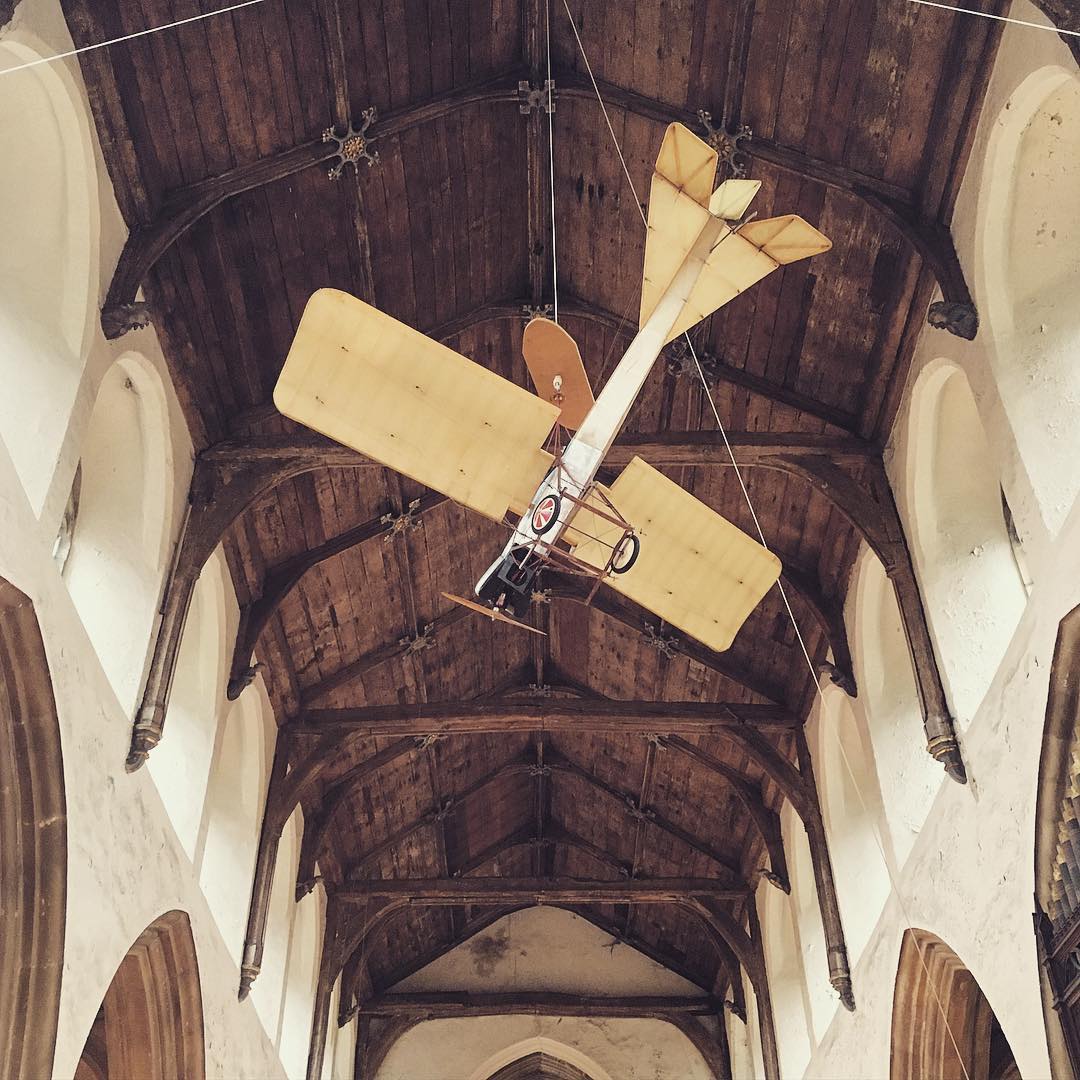 Curious, curious city is #Norwich. This is a #plane in an #antiques shop in an old #church. #rafters #architecture